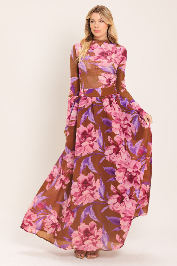 Woman wearing a brown floral maxi skirt with pink and purple flowers | Flying Tomato