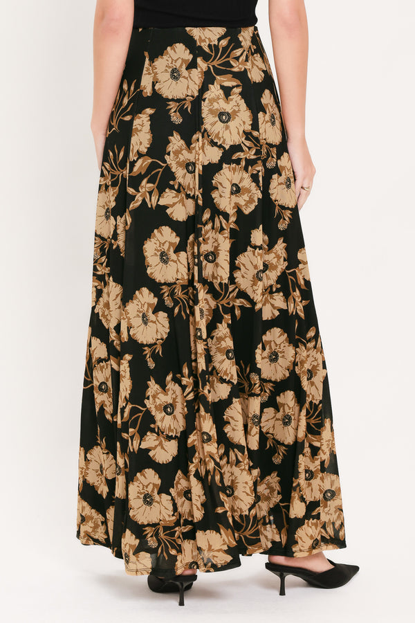 A high-waisted, power mesh maxi skirt with a black base and a large beige floral pattern | Flying Tomato