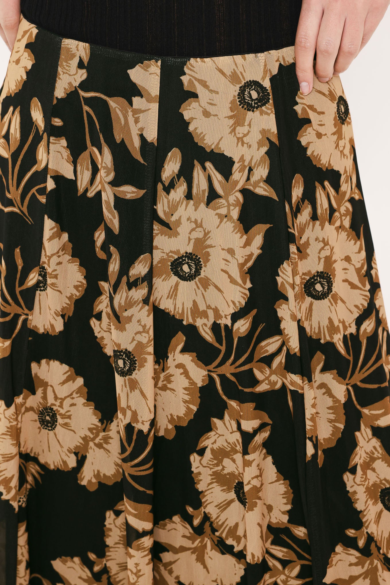 A high-waisted, power mesh maxi skirt with a black base and a large beige floral pattern | Flying Tomato