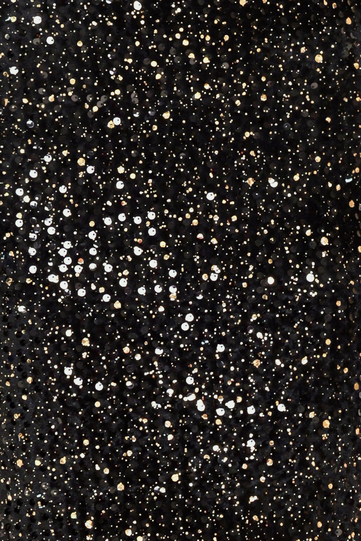 A black sequined midi skirt worn by a model | Flying Tomato