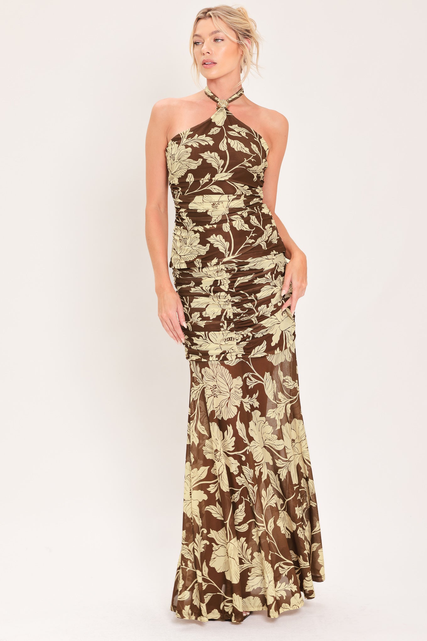 A woman modeling a power mesh maxi skirt brown and beige floral print | Flying Tomato
