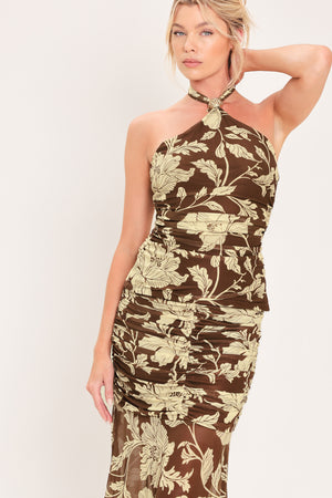 A woman modeling a power mesh maxi skirt brown and beige floral print | Flying Tomato