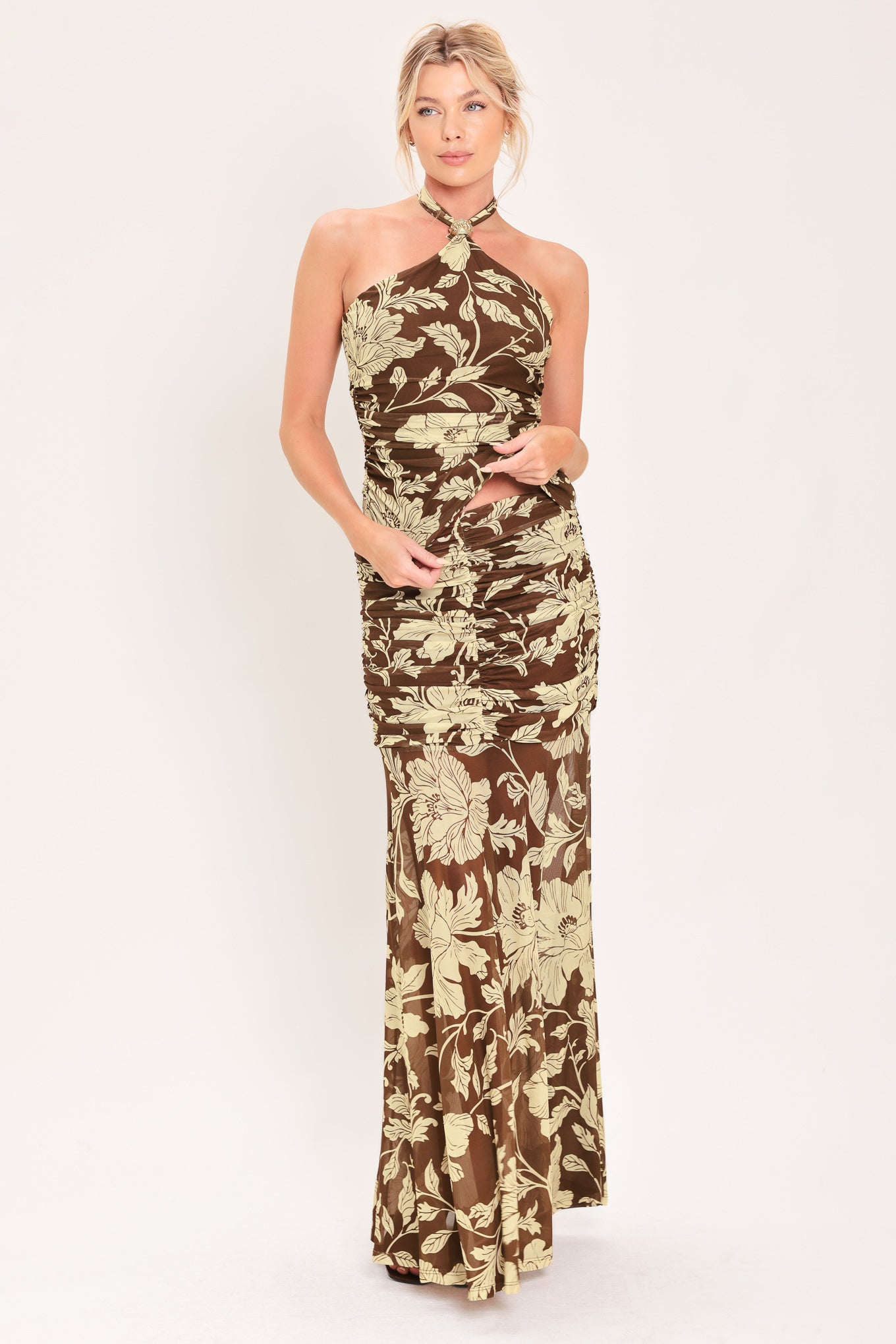 A woman modeling a power mesh maxi skirt brown and beige floral print | Flying Tomato