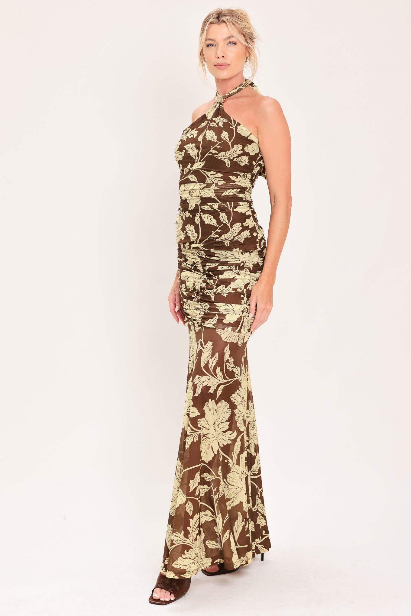 A woman modeling a power mesh maxi skirt brown and beige floral print | Flying Tomato