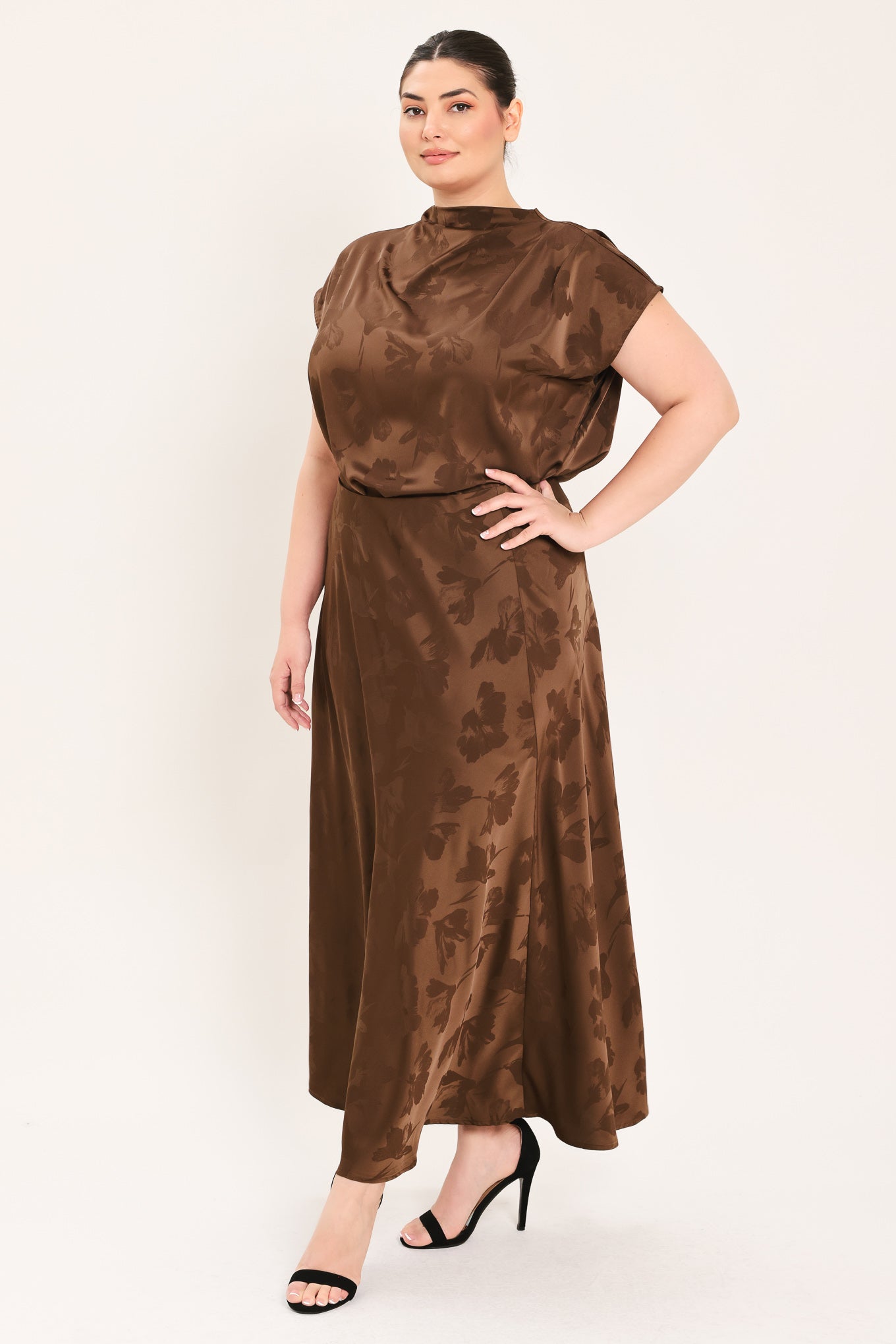 Woman wearing a brown woven jacquard midi skirt with back zipper closure | Plus Curve Flying Tomato