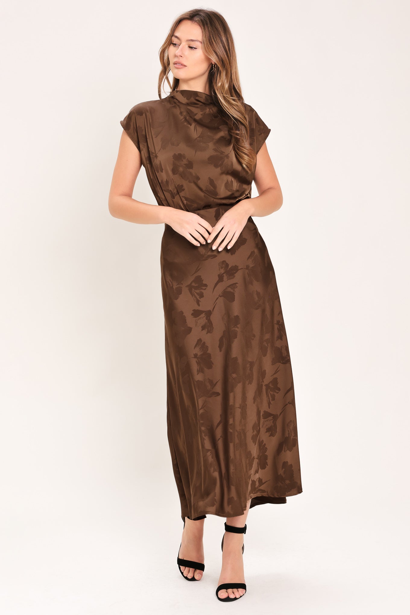Woman wearing a brown woven jacquard midi skirt with back zipper closure | Flying Tomato