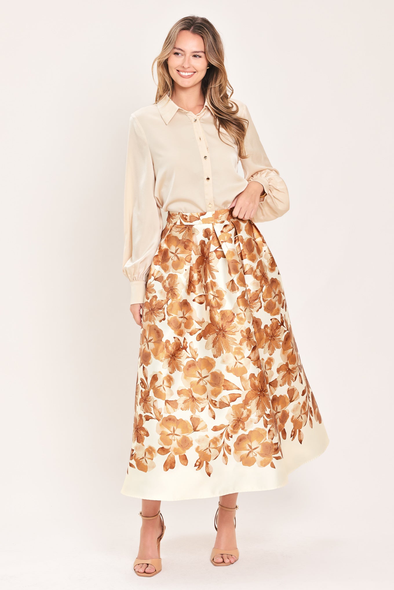 A high-waisted A-line midi skirt with a brown floral print | Flying Tomato