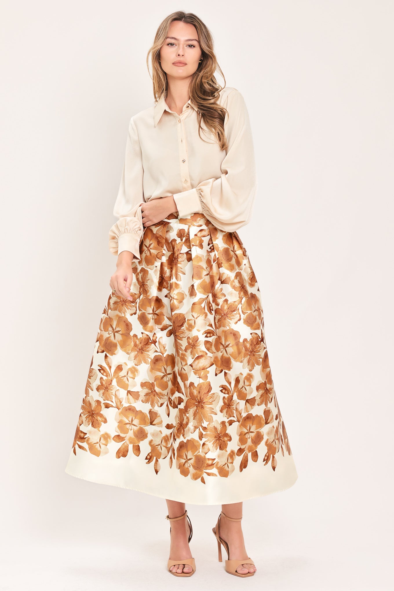 A high-waisted A-line midi skirt with a brown floral print | Flying Tomato
