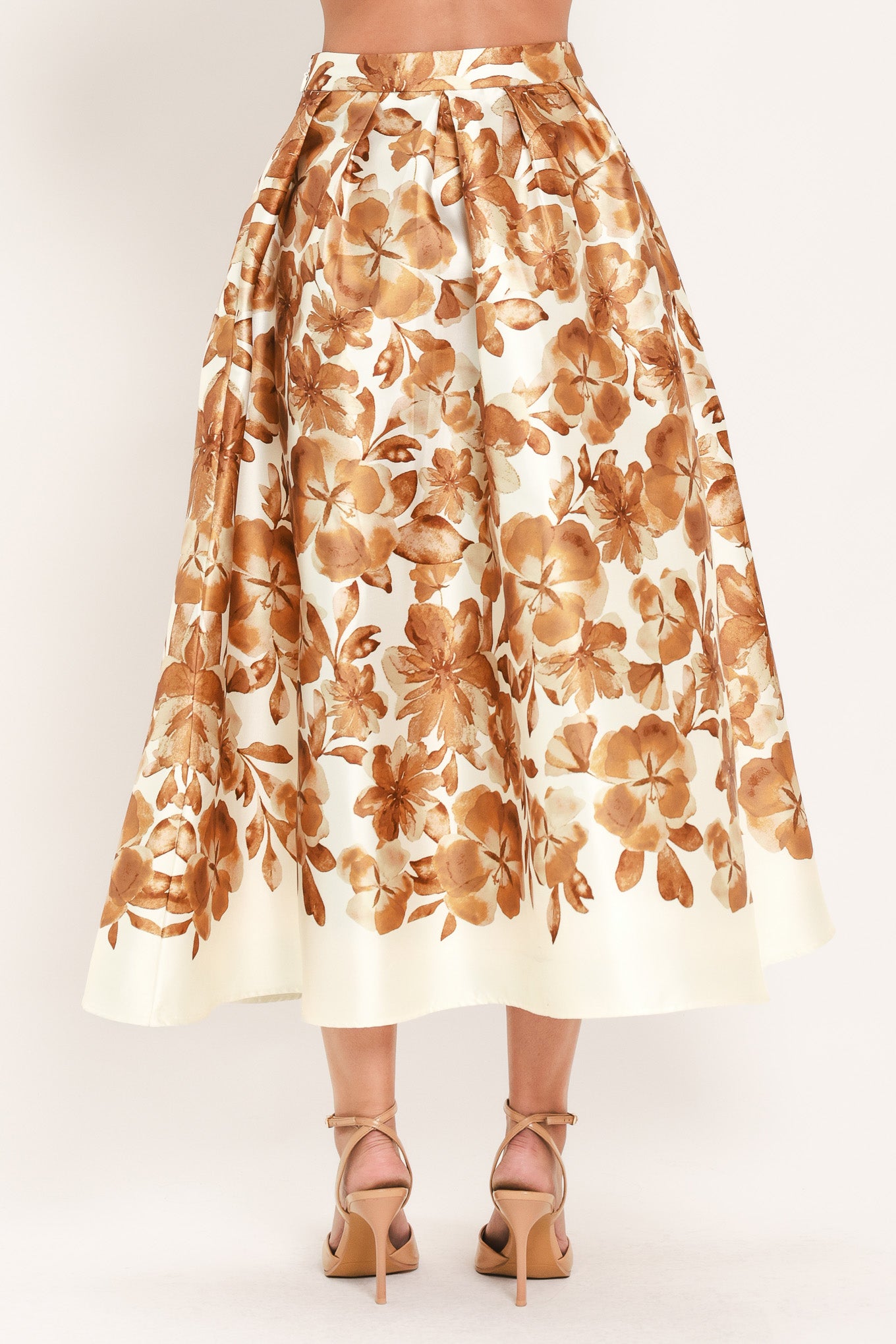 A high-waisted A-line midi skirt with a brown floral print | Flying Tomato