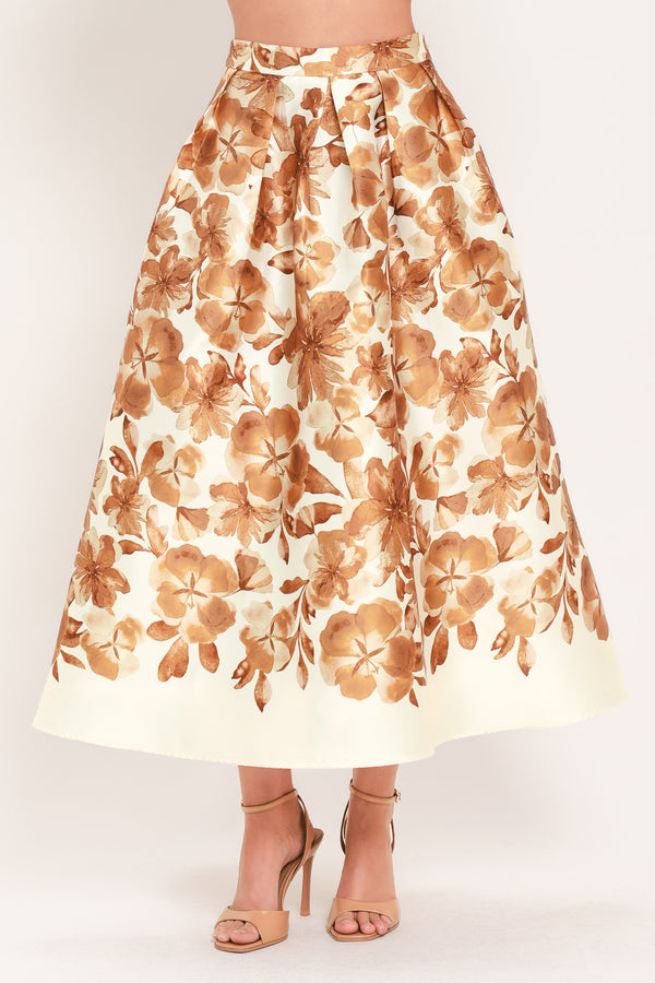 A high-waisted A-line midi skirt with a brown floral print | Flying Tomato