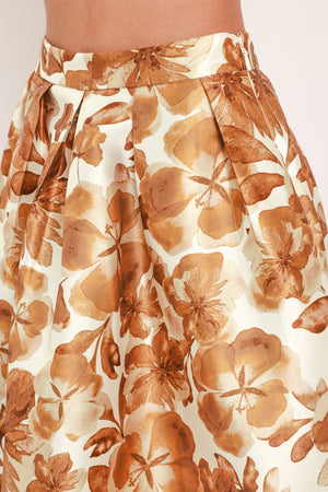 A high-waisted A-line midi skirt with a brown floral print | Flying Tomato