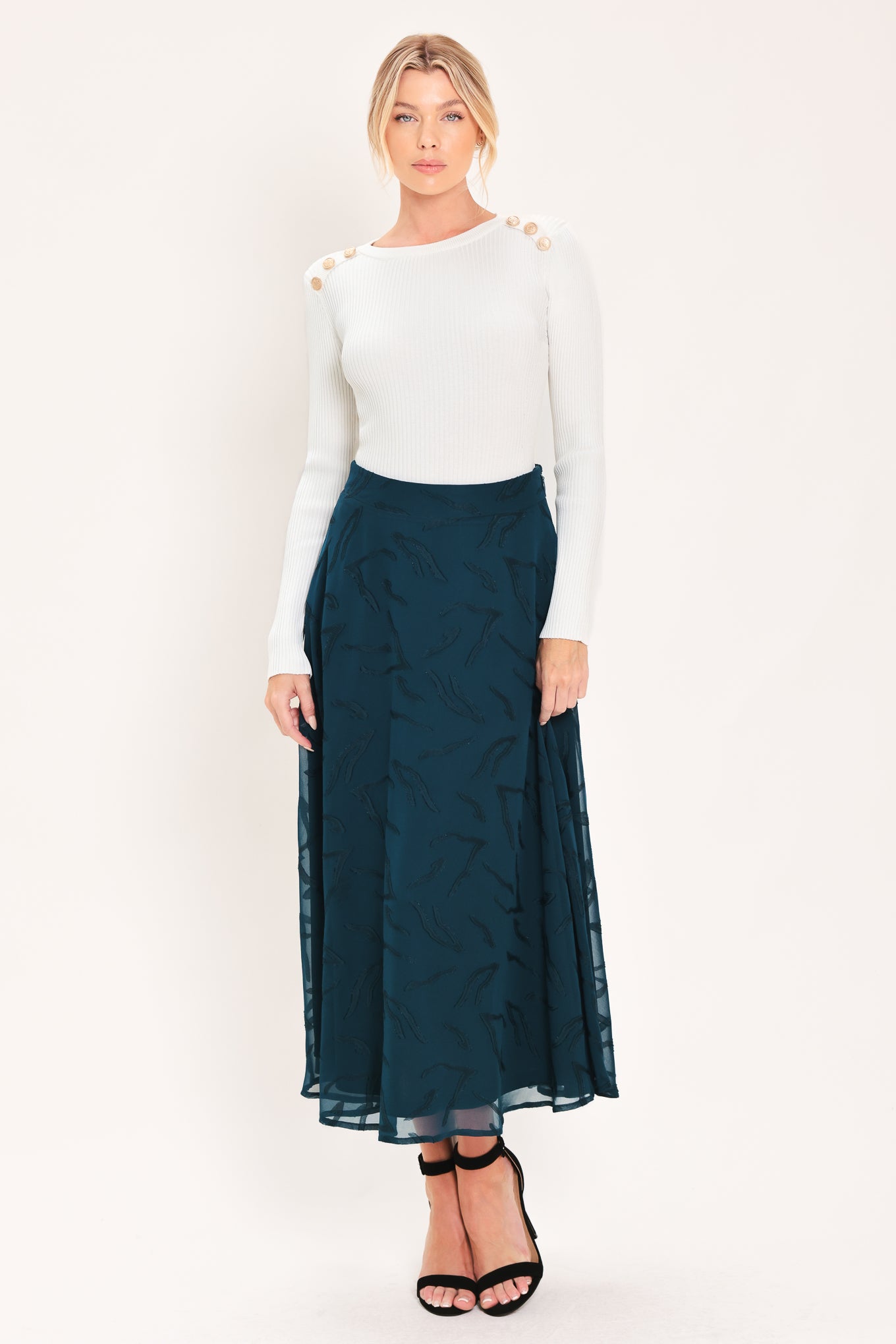 A dark teal blue midi skirt with a subtle tonal leaf pattern | Flying Tomato