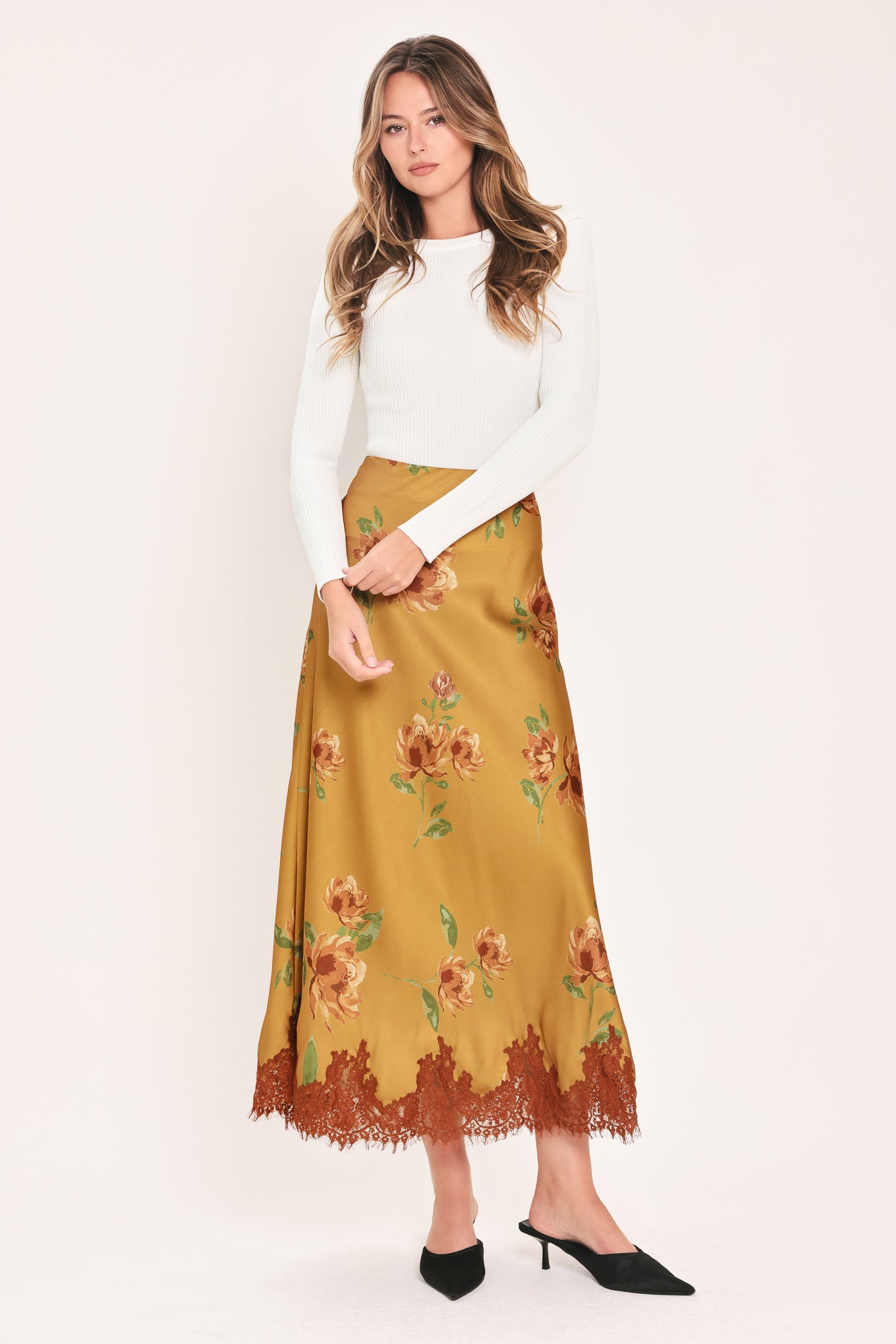 A camel yellow midi skirt with a brown and green floral print and a brown lace hem | Flying Tomato