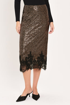 A woman modeling a bronze sequined midi skirt with a black lace hem | Flying Tomato