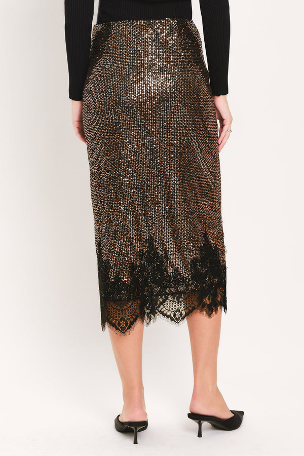 A woman modeling a bronze sequined midi skirt with a black lace hem | Flying Tomato