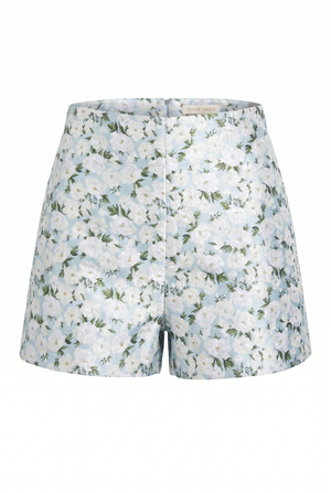 Blue jacquard shorts with white flowers printed on over a white background | Flying Tomato