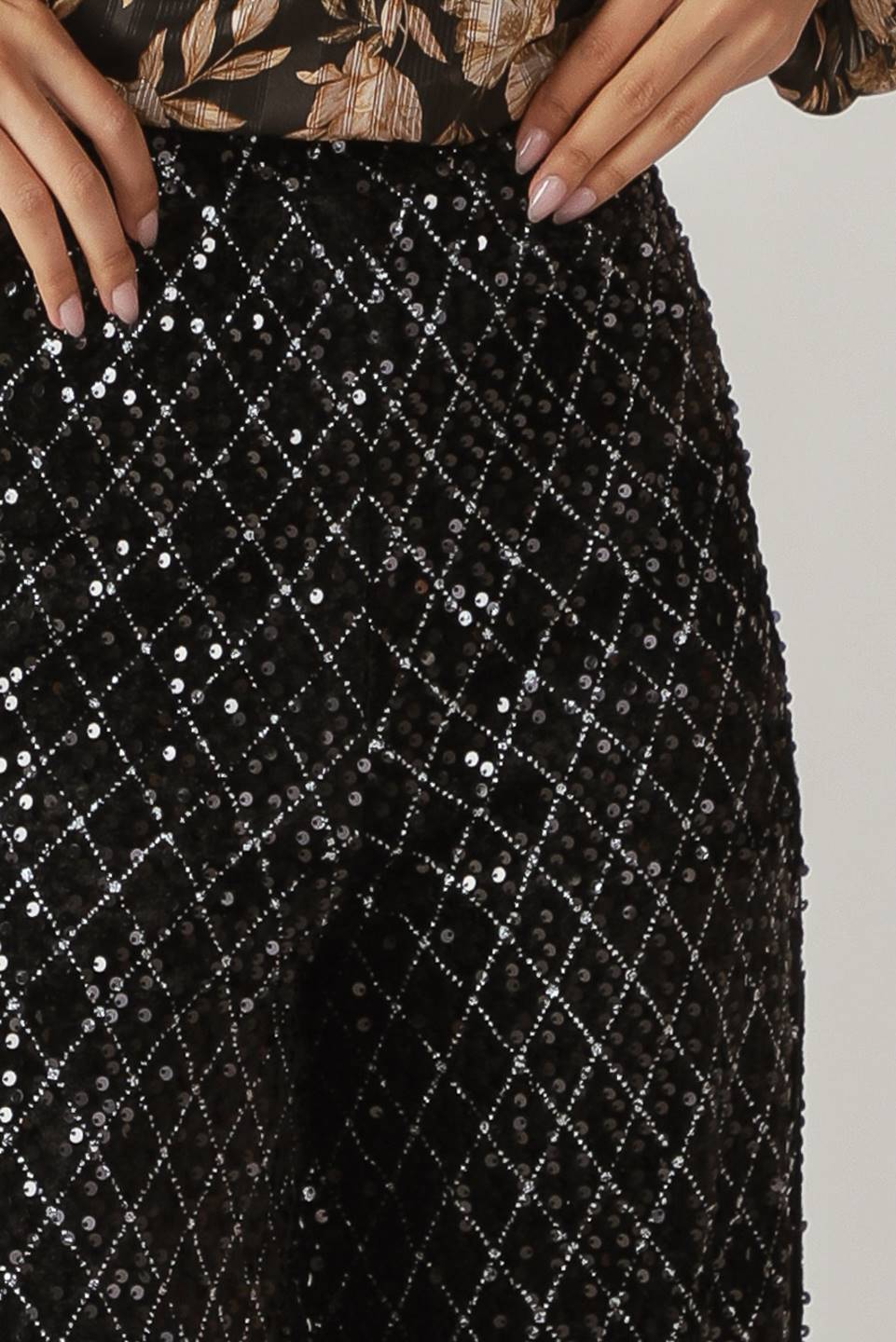 Woman wearing black sequin pants | FREEMARKET