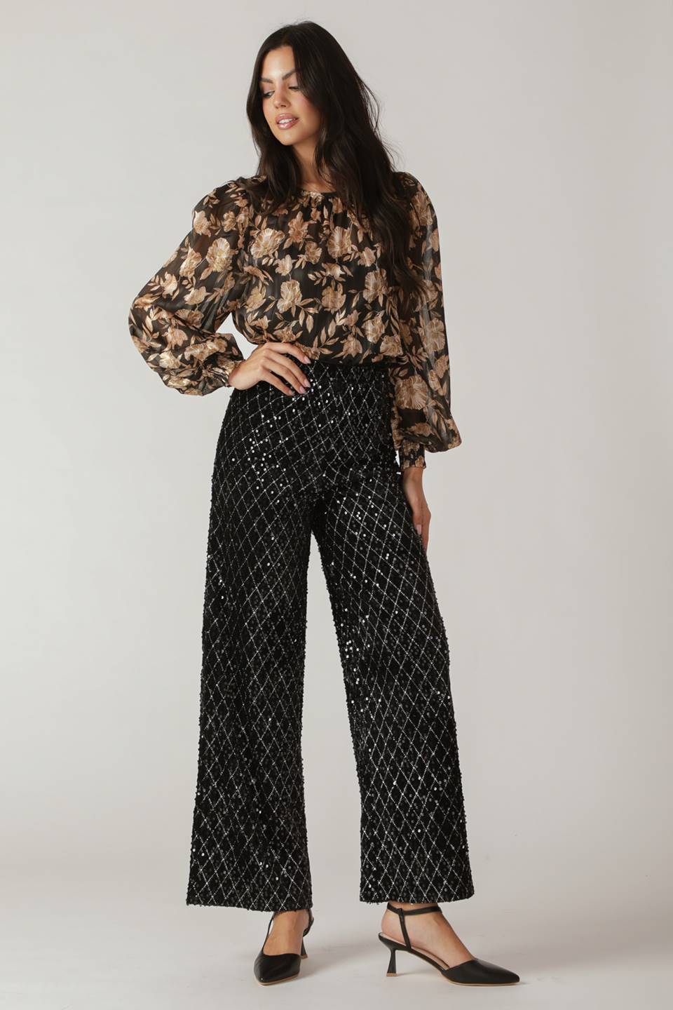 Woman wearing black sequin pants | FREEMARKET