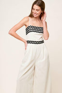 MEET AT THE PIER CREAM WOVEN JUMPSUIT.