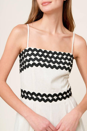 MEET AT THE PIER CREAM WOVEN JUMPSUIT.
