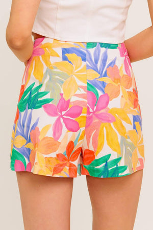 A printed woven skort with side zipper closure.