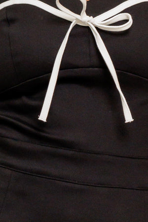 NOIR BOW COUTURE WOVEN SKORT ROMPER.