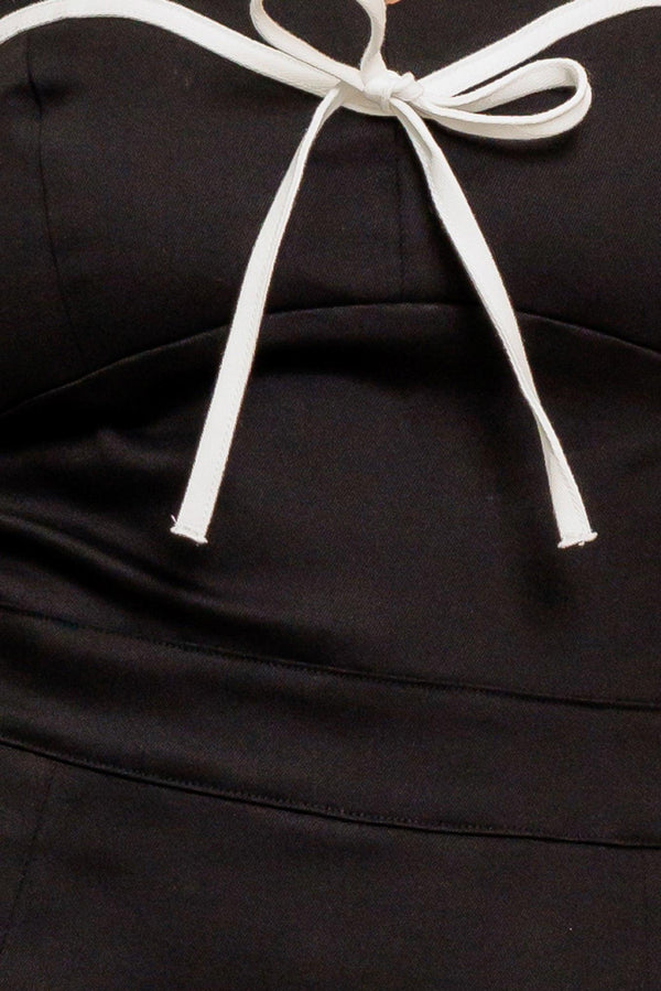 NOIR BOW COUTURE WOVEN SKORT ROMPER.