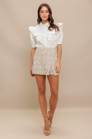 A woven tweed skort with back zipper closure