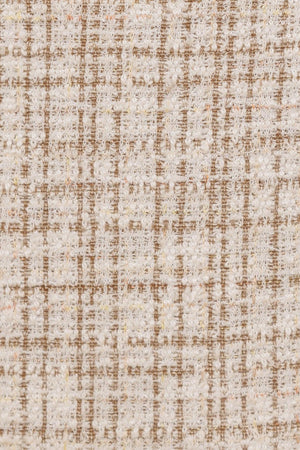 A woven tweed skort with back zipper closure