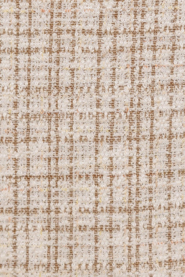 A woven tweed skort with back zipper closure