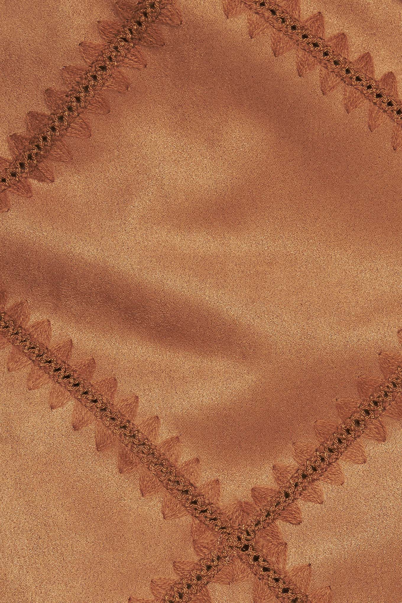 A faux suede patch work skort with side zipper closure