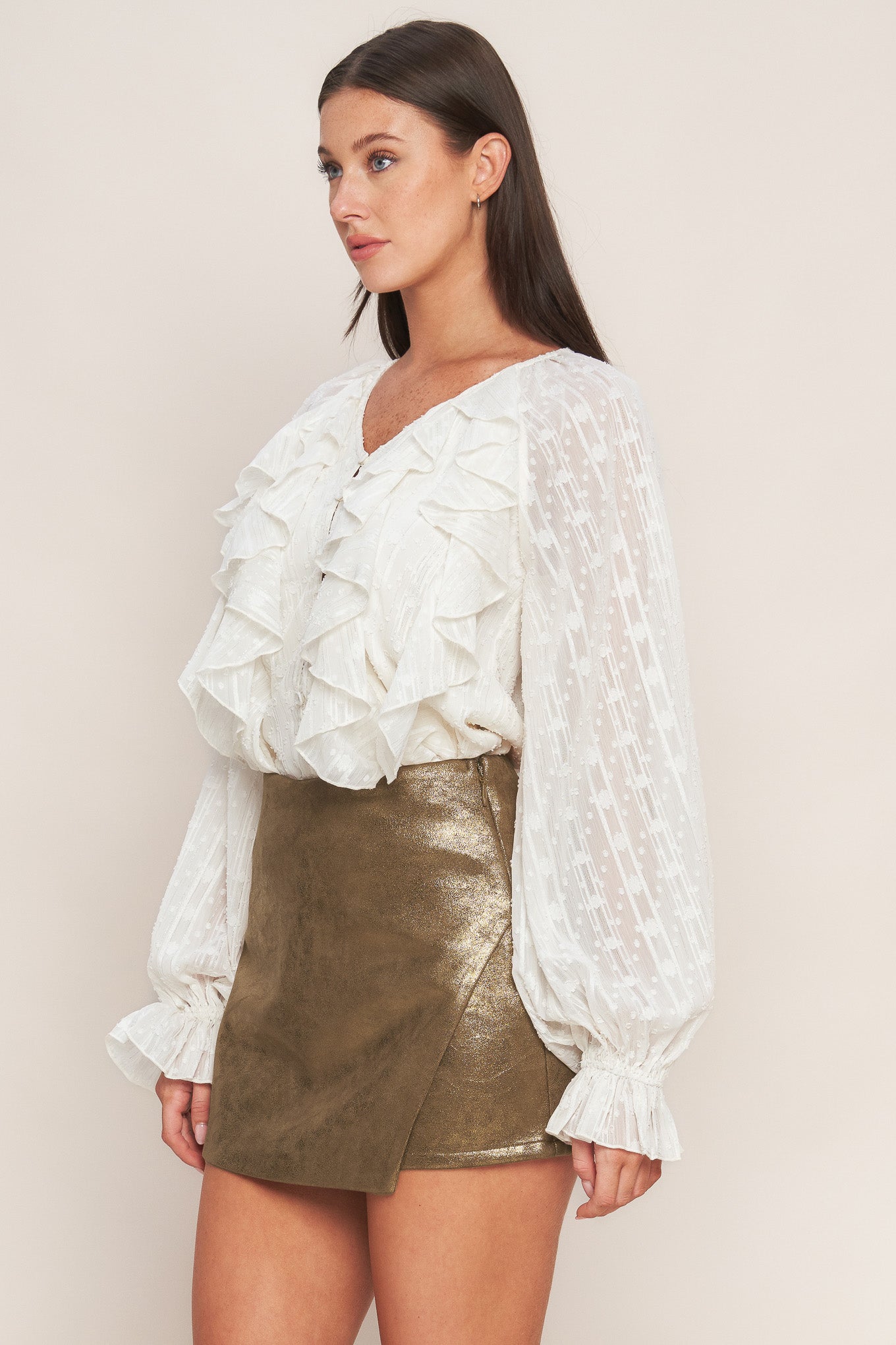A foiled faux leather skort with side zipper closure
