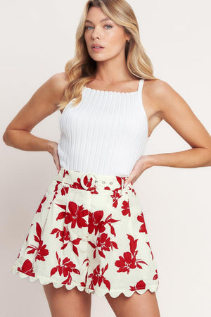 
A printed woven short featuring front closure, self belt, side pocket and trimmed hemline. Matching top IT13916B

Details:

Self : 100% Cotton

Size &amp; Fit

- Model is 5`8" And Wearing Size Small
- Measurements Taken From Size Small
- Approx. Length: 16"