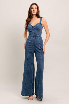 
A washed denim jumpsuit featuring V neckline, straps and front zipper closure

Details:

Self : 99% Cotton 1% Spandex

Size &amp; Fit

- Model is 5`8" And Wearing Size Small
- Measurements Taken From Size Small
- Approx. Length: 60" FLYING TOMATO