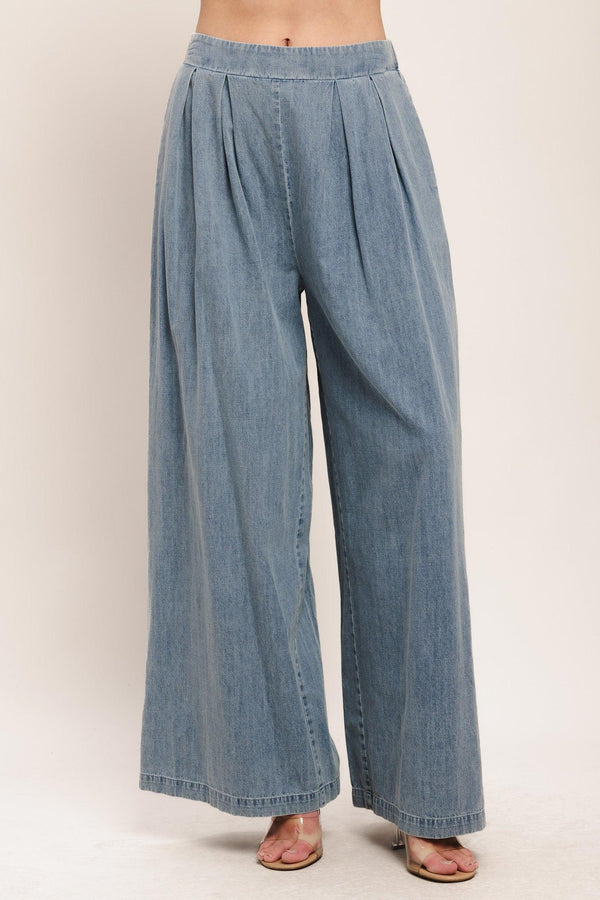 A lightweight washed denim pant with front pleats, wide leg and elasticized back waistband. Matching top IT14026B

Details:

Self: 100% Cotton

Contrast: 100% Cotton

Size & Fit

-Model is 5`8" And Wearing Size Small
-Measurements Taken From Size Small
-Approx. Length: 43"