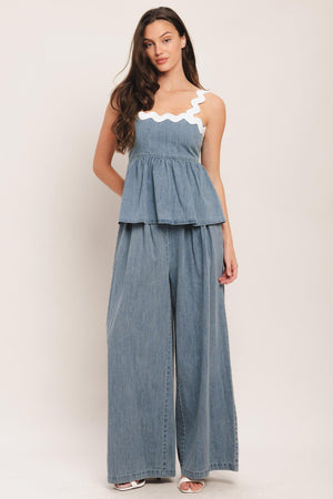A lightweight washed denim pant with front pleats, wide leg and elasticized back waistband. Matching top IT14026B

Details:

Self: 100% Cotton

Contrast: 100% Cotton

Size & Fit

-Model is 5`8" And Wearing Size Small
-Measurements Taken From Size Small
-Approx. Length: 43"