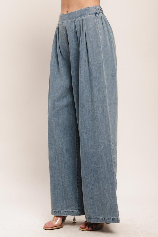 A lightweight washed denim pant with front pleats, wide leg and elasticized back waistband. Matching top IT14026B

Details:

Self: 100% Cotton

Contrast: 100% Cotton

Size & Fit

-Model is 5`8" And Wearing Size Small
-Measurements Taken From Size Small
-Approx. Length: 43"