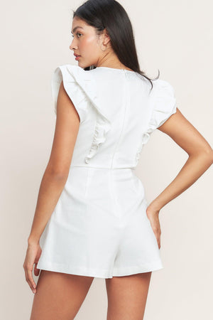 JUST FEELS RIGHT WOVEN ROMPER.