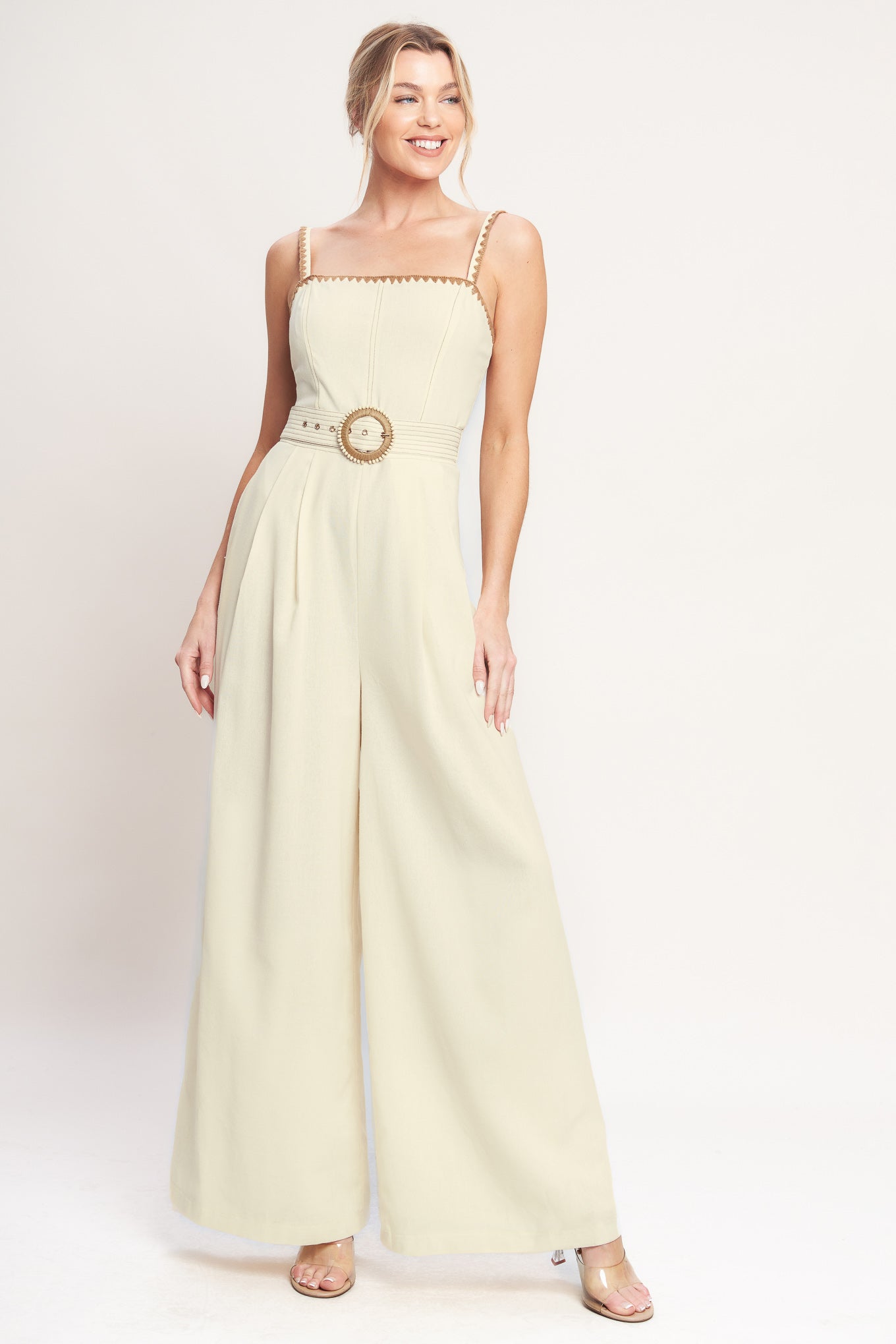 A solid woven jumpsuit featuring straight neckline, straps, wide self belt, wide leg and back zipper closure

Details:

Self: 60% Viscose 30% Linen 10% Polyester

Lining: 100% Cotton

Size & Fit

-Model is 5`8" And Wearing Size Small
-Measurements Taken From Size Small
-Approx. Length: 60"