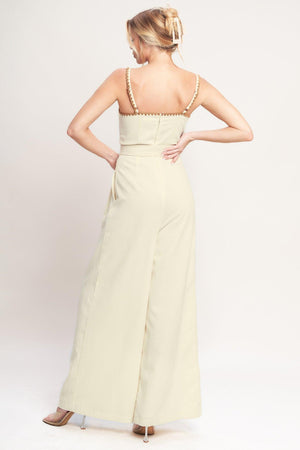 THE QUIET STATEMENT WOVEN JUMPSUIT.