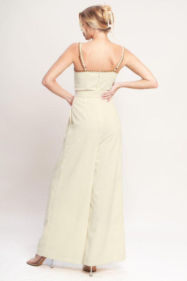 THE QUIET STATEMENT WOVEN JUMPSUIT.