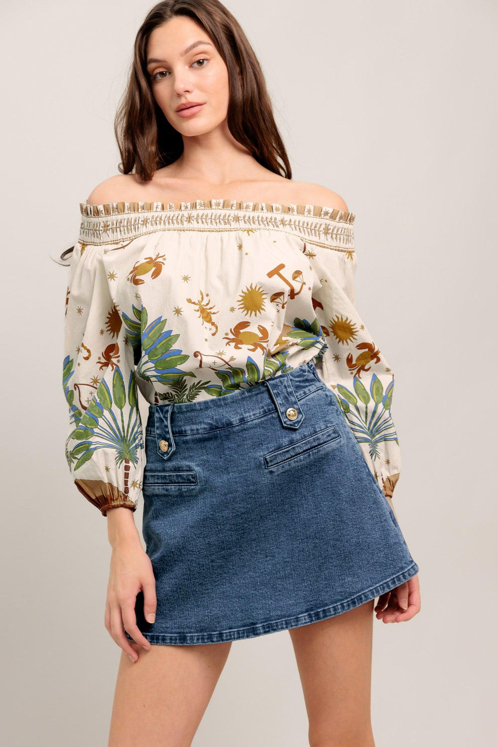 High-waisted washed denim mini skirt with a clean A-line shape and gold button details

Details:

Self: 99% Cotton 1% Spandex

Size & Fit

- Model is 5`8" And Wearing Size Small
- Measurements Taken From Size Small
- Approx. Length: 16"
