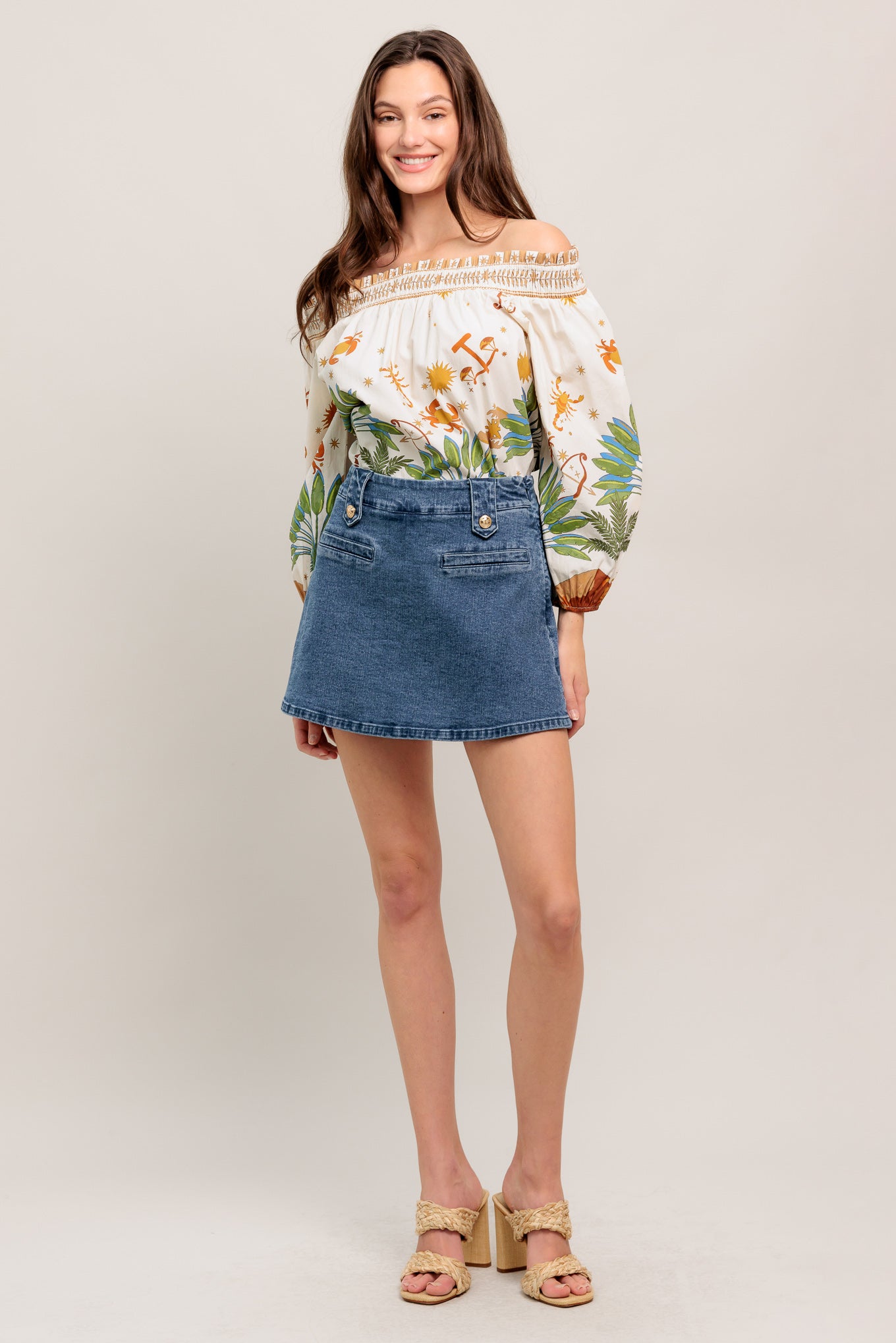High-waisted washed denim mini skirt with a clean A-line shape and gold button details

Details:

Self: 99% Cotton 1% Spandex

Size & Fit

- Model is 5`8" And Wearing Size Small
- Measurements Taken From Size Small
- Approx. Length: 16"