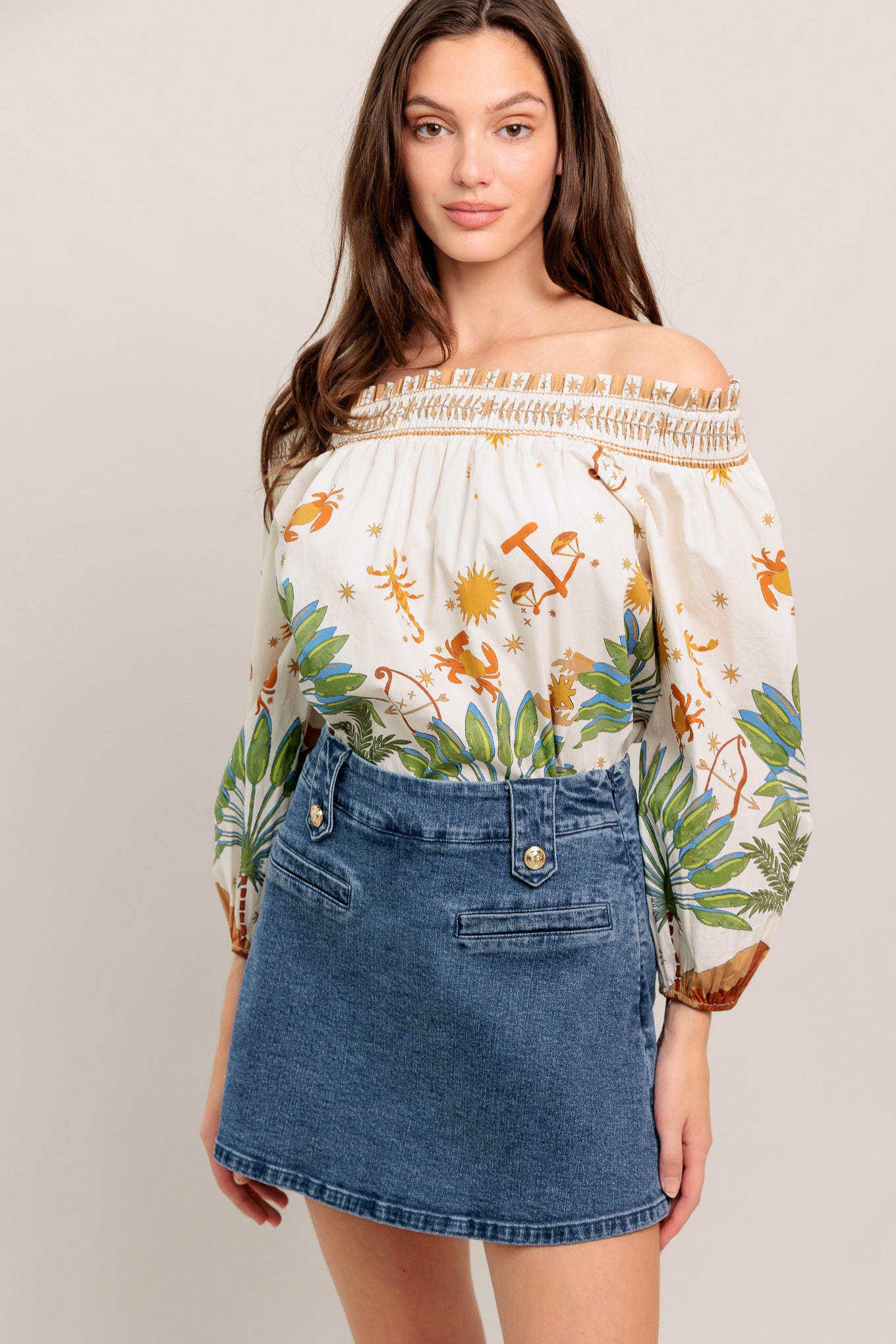 High-waisted washed denim mini skirt with a clean A-line shape and gold button details

Details:

Self: 99% Cotton 1% Spandex

Size & Fit

- Model is 5`8" And Wearing Size Small
- Measurements Taken From Size Small
- Approx. Length: 16"