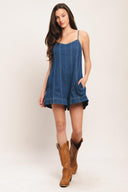 A lightweight denim romper with back tie and zipper closure

Details:

Self: 100% Cotton

Size & Fit

-Model is 5`8" And Wearing Size Small
-Measurements Taken From Size Small
-Approx. Length: 32"