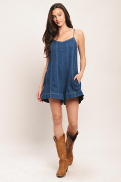 A lightweight denim romper with back tie and zipper closure

Details:

Self: 100% Cotton

Size & Fit

-Model is 5`8" And Wearing Size Small
-Measurements Taken From Size Small
-Approx. Length: 32"