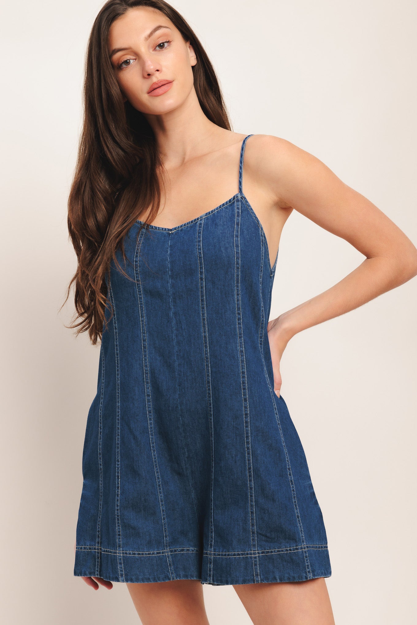A lightweight denim romper with back tie and zipper closure

Details:

Self: 100% Cotton

Size & Fit

-Model is 5`8" And Wearing Size Small
-Measurements Taken From Size Small
-Approx. Length: 32"