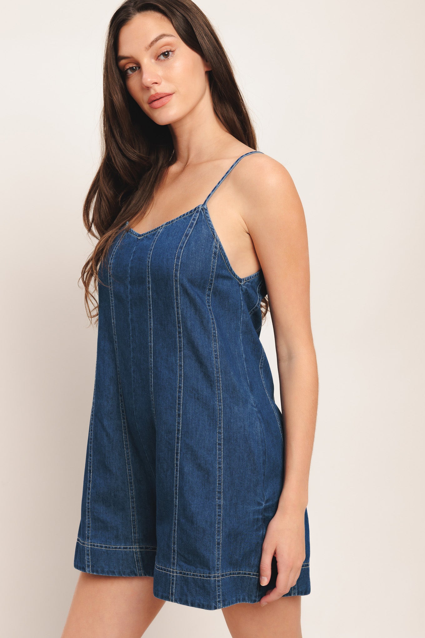 A lightweight denim romper with back tie and zipper closure

Details:

Self: 100% Cotton

Size & Fit

-Model is 5`8" And Wearing Size Small
-Measurements Taken From Size Small
-Approx. Length: 32"