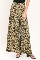 Woman wearing leopard print wide leg pant with front closure | Flying Tomato