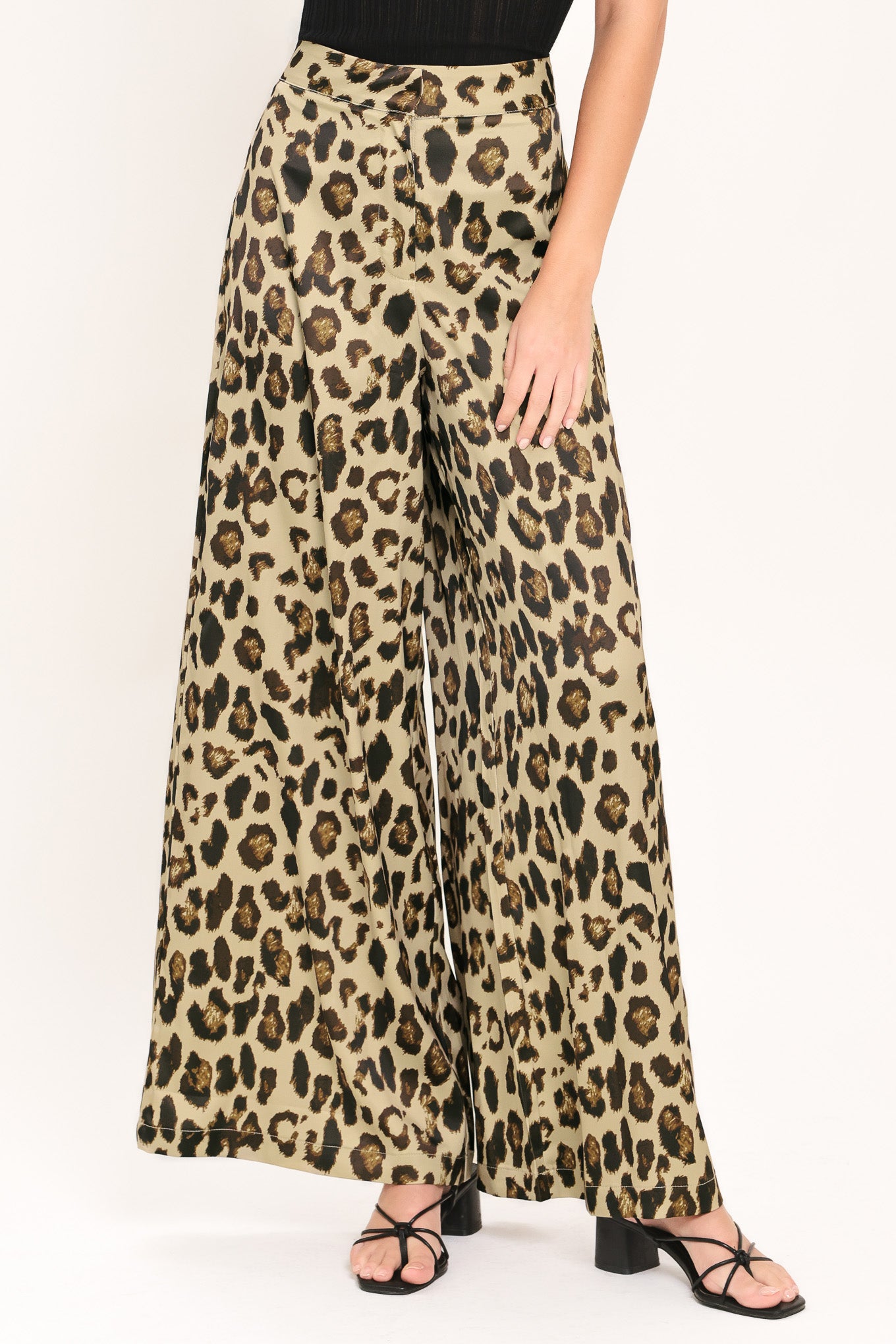 Woman wearing leopard print wide leg pant with front closure | Flying Tomato